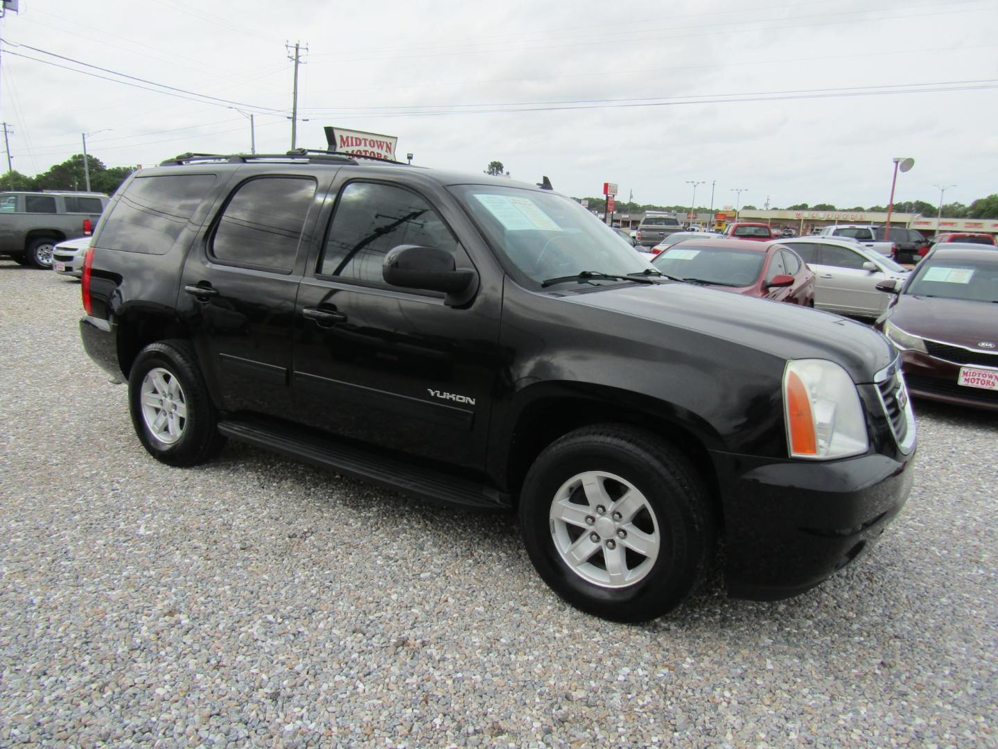 2012 Black /Gray GMC Yukon SLE1 2WD (1GKS1AE03CR) with an 5.3L V8 OHV 16V FFV engine, Automatic transmission, located at 15016 S Hwy 231, Midland City, AL, 36350, (334) 983-3001, 31.306210, -85.495277 - Photo#0